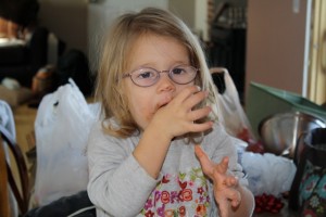 toddler helps bake cookies